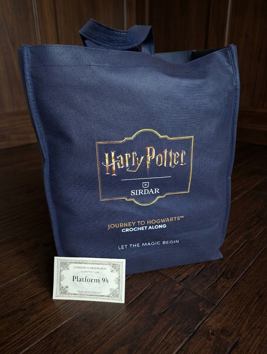 The Sirdar Harry Potter Journey to Hogwarts Crochet Along bag with a Platform 9¾ ticket